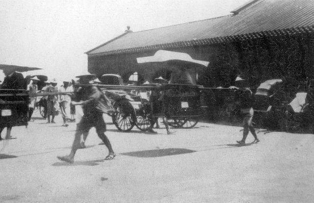 1930 Sedan Chair Shelter - Coolies and their Customers