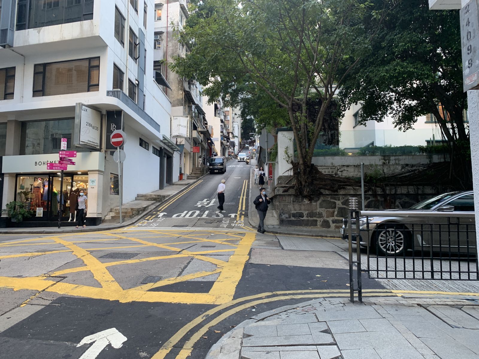 At the intersection in front of PMQ, take a right turn
